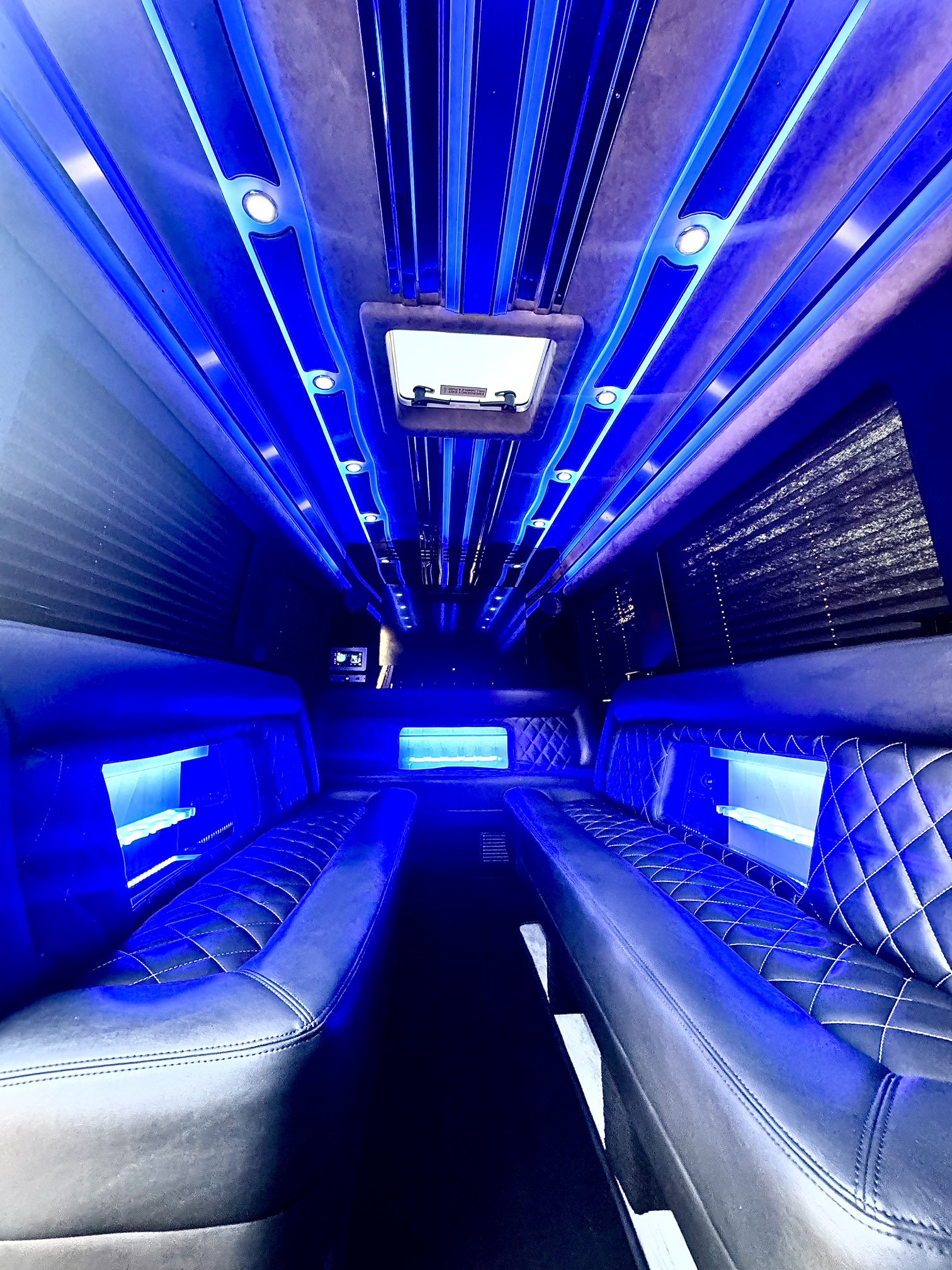 Luxury party bus interior with blue LED lighting